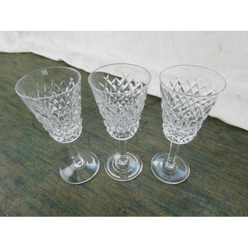 140 - Three Waterford crystal sherry glasses.