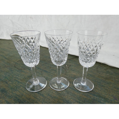 140 - Three Waterford crystal sherry glasses.