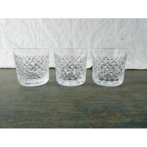 144 - Three cut glass whiskey tumblers .