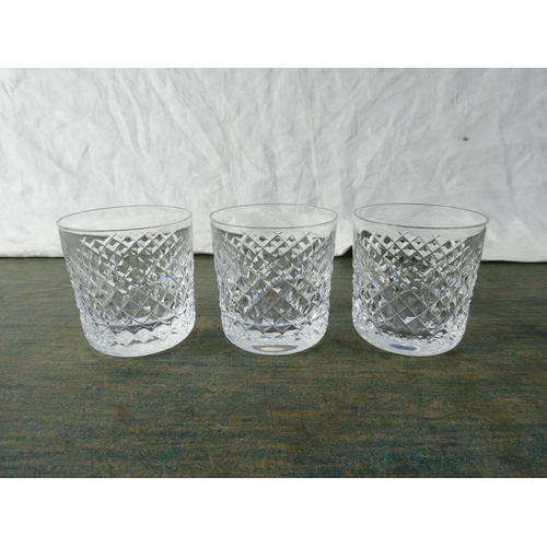 144 - Three cut glass whiskey tumblers .