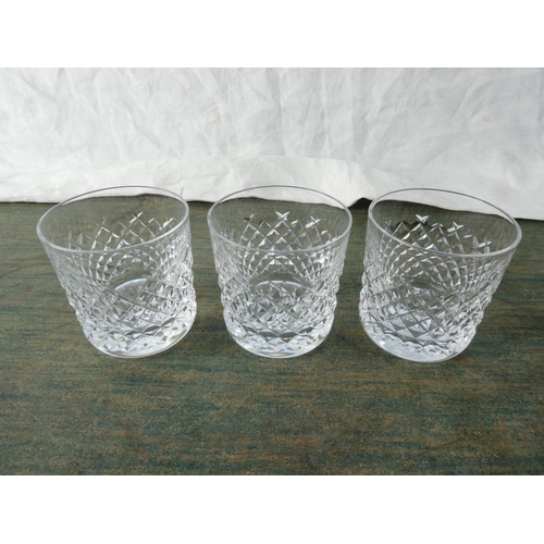 144 - Three cut glass whiskey tumblers .