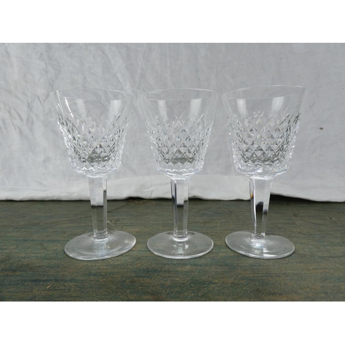 147 - Three Waterford Crystal wine glasses.