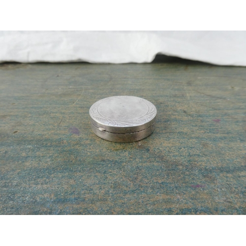 151 - A sterling silver pill box.