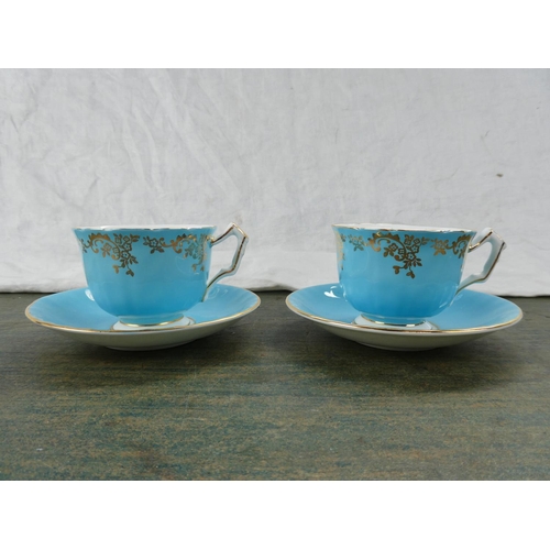 154 - Two Aynsley cabinet cups and saucers.