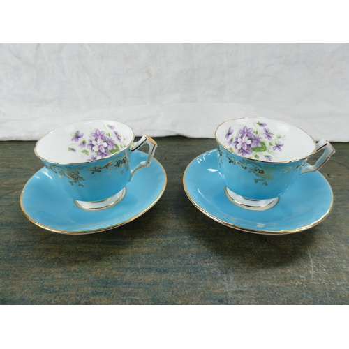 154 - Two Aynsley cabinet cups and saucers.