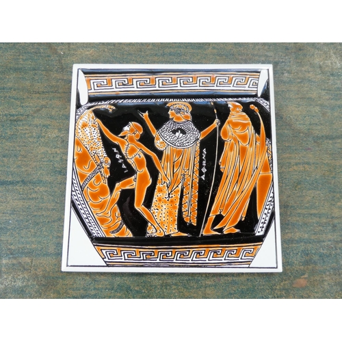 155 - A decorative tile plaque.