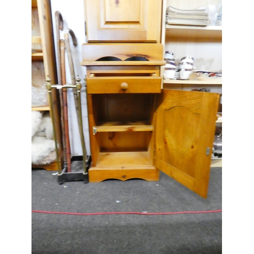 163 - A pair of pine bedside lockers.