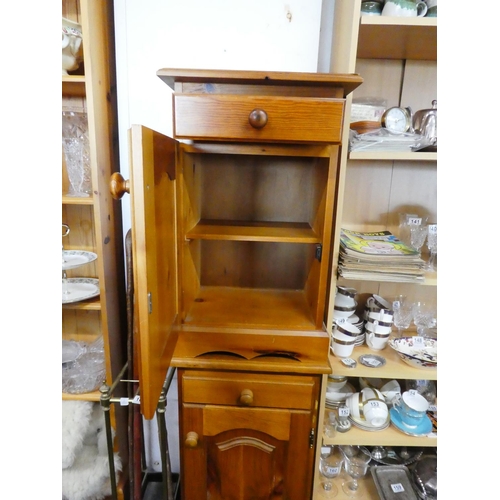 163 - A pair of pine bedside lockers.