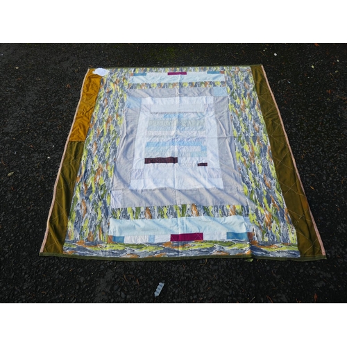 170 - A stunning antique patchwork blanket/ quilt, made from 1950's curtain material and linen pieces.