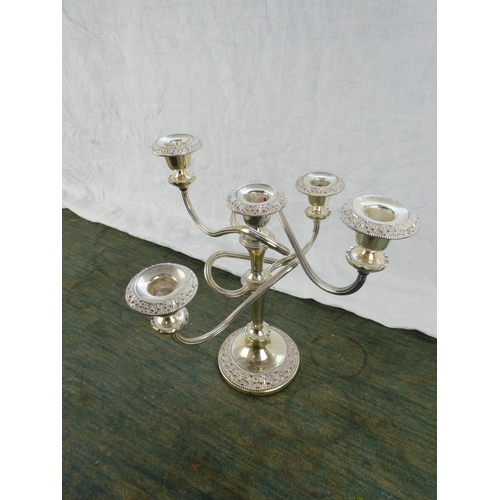 43 - A five branch silver plated candelabra.