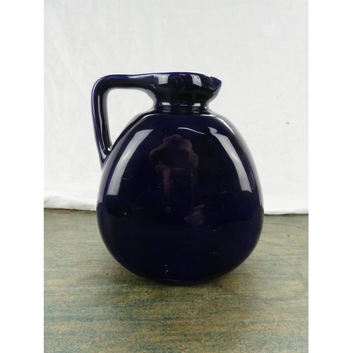 75 - A Bourne Denby pottery jug.