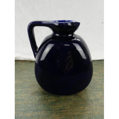 75 - A Bourne Denby pottery jug.