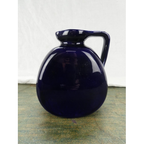 75 - A Bourne Denby pottery jug.