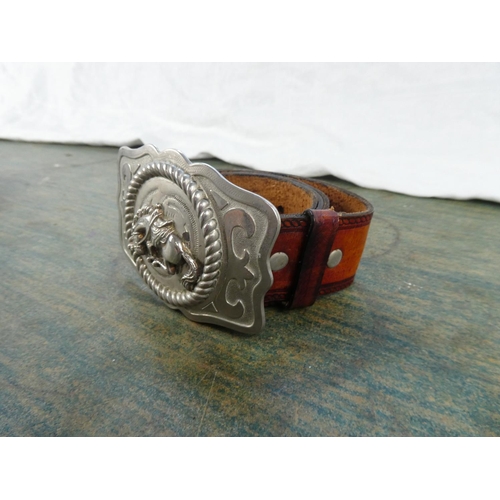 8 - A Harley Davidson leather belt and buckle and a 501 leather belt and buckle.