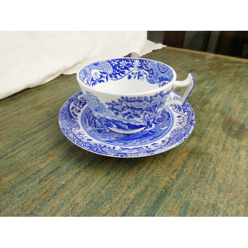 88 - A collection of blue and white ware to include a Crown Devon milk jug in the shape of a cow, a Spode... 