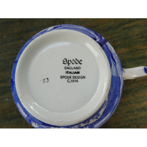 88 - A collection of blue and white ware to include a Crown Devon milk jug in the shape of a cow, a Spode... 