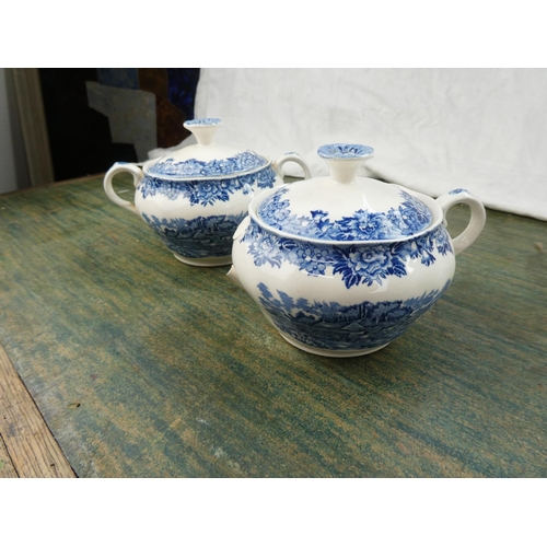 88 - A collection of blue and white ware to include a Crown Devon milk jug in the shape of a cow, a Spode... 