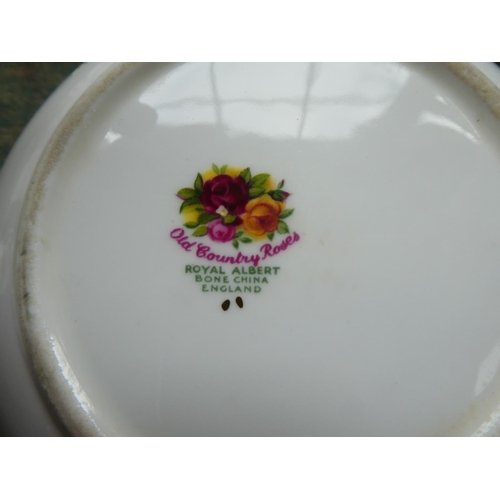 89 - A collection of Royal Albert Old Country Rose to include a sandwich plate, milk jug and sugar bowls,... 