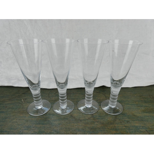 91 - A stunning set of etched stem wine glasses and another.