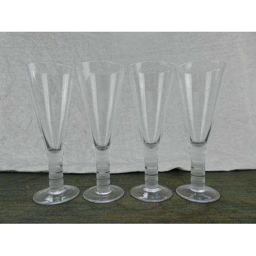 91 - A stunning set of etched stem wine glasses and another.