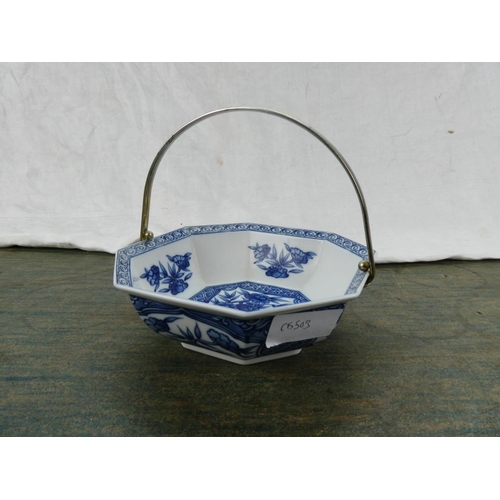 93 - A Chinese/ Oriental dish with a silver plated handle.