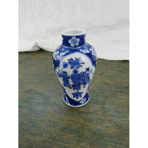 96 - A Chinese/ Oriental blue and white vase.