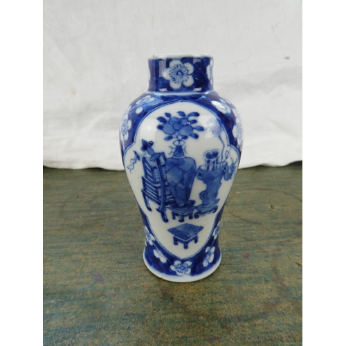 96 - A Chinese/ Oriental blue and white vase.