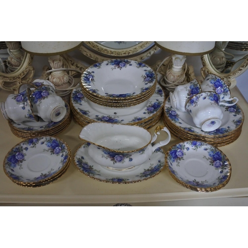 241 - A stunning Royal Albert Moonlight Rose tea set, dinner plates, soup bowl, and more.