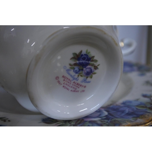 241 - A stunning Royal Albert Moonlight Rose tea set, dinner plates, soup bowl, and more.