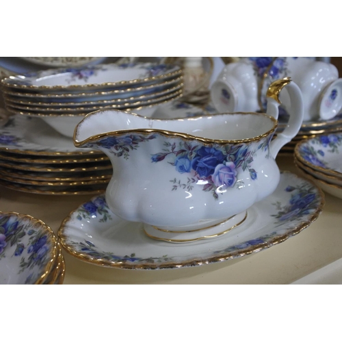 241 - A stunning Royal Albert Moonlight Rose tea set, dinner plates, soup bowl, and more.