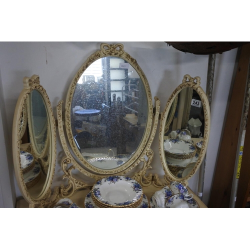 243 - A vintage three sectional dressing table mirror.