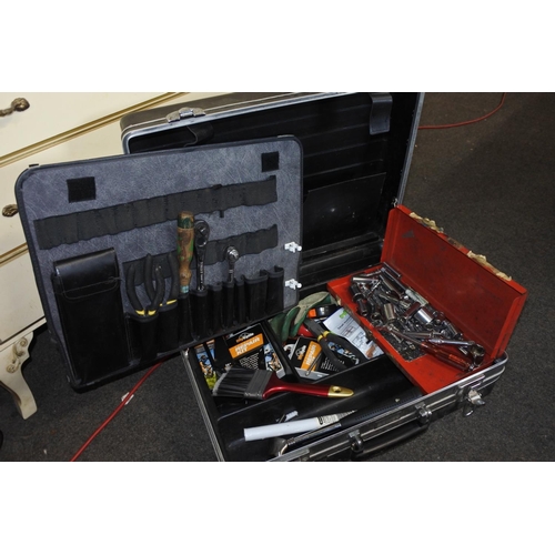 249 - A storage case containing an assortment of tools.