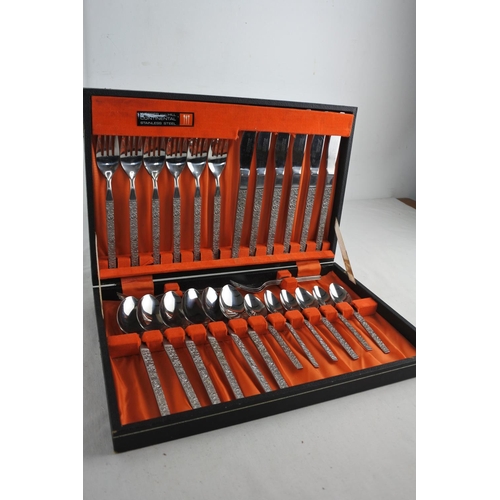 251 - A boxed vintage set of cutlery by Webber & Hill.