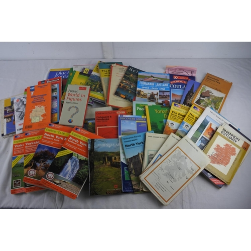 253 - A large assortment of road maps and more.