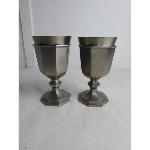 263 - A pair of German pewter goblets.