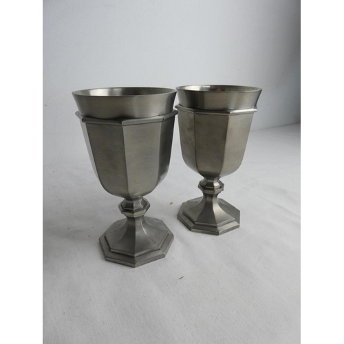 263 - A pair of German pewter goblets.