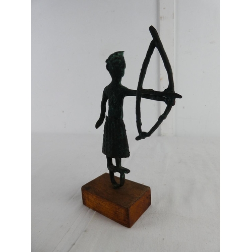 271 - An unusual copper figure on stand.