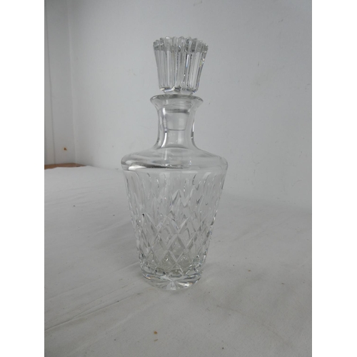 278 - A cut glass decanter.