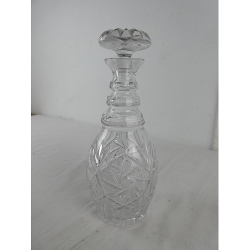 279 - A cut glass decanter.