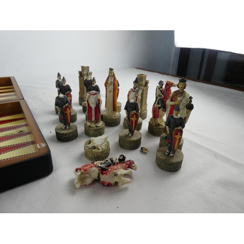 286 - A cased chess set (a/f).