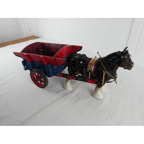 292 - A ceramic Clydesdale horse and cart.