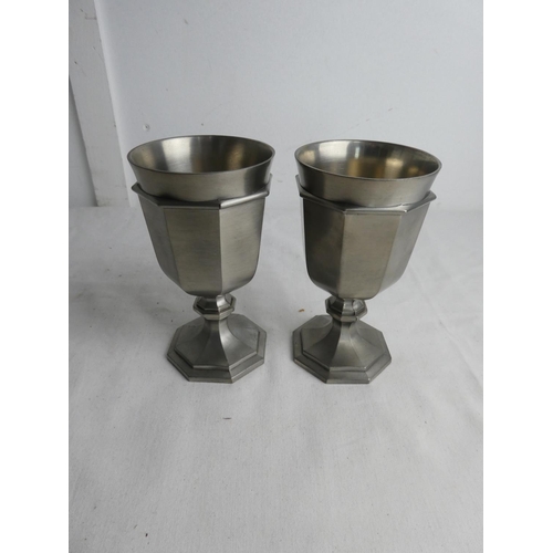 263 - A pair of German pewter goblets.