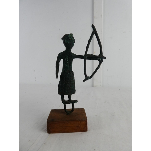 271 - An unusual copper figure on stand.