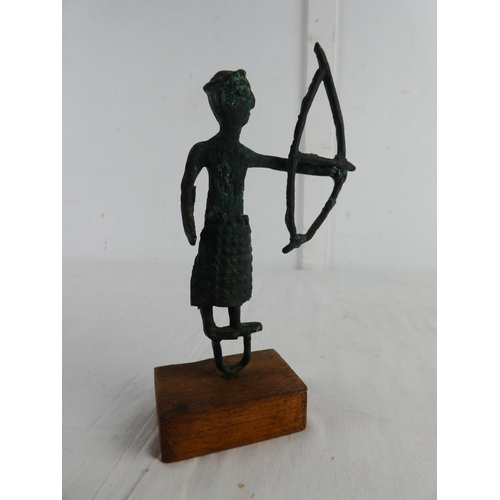 271 - An unusual copper figure on stand.