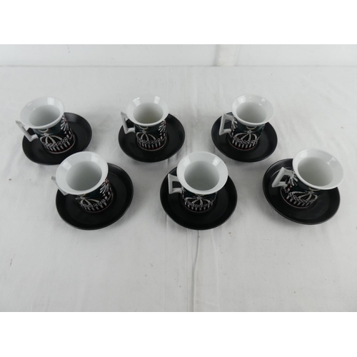 283 - A set of six Portmeirion pottery 'Magic City' cups and saucers,