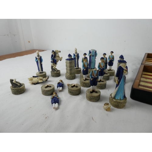 286 - A cased chess set (a/f).