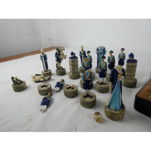 286 - A cased chess set (a/f).