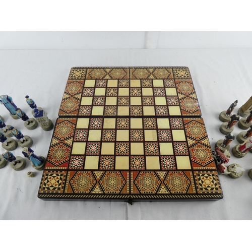 286 - A cased chess set (a/f).