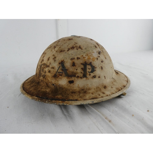 295 - A British WW2 era steel brodie helmet, stencilled with F.A.P & 3 diamonds. 'A.P' to rear.