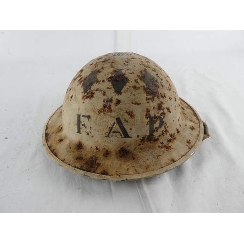 295 - A British WW2 era steel brodie helmet, stencilled with F.A.P & 3 diamonds. 'A.P' to rear.